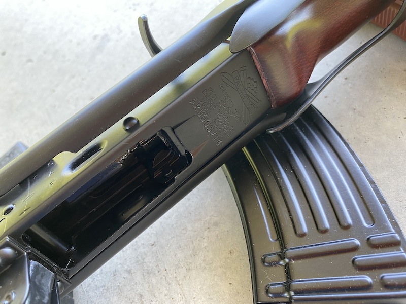 There's nothing about reloading an AK-47 that's especially fast. This is a skill that requires muscle memory. In time, even the narrow stamped slots like this one won't seem like that much of an impediment.