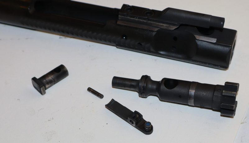 Bolt carrier with Slip 2000 EWL30 residue glistening