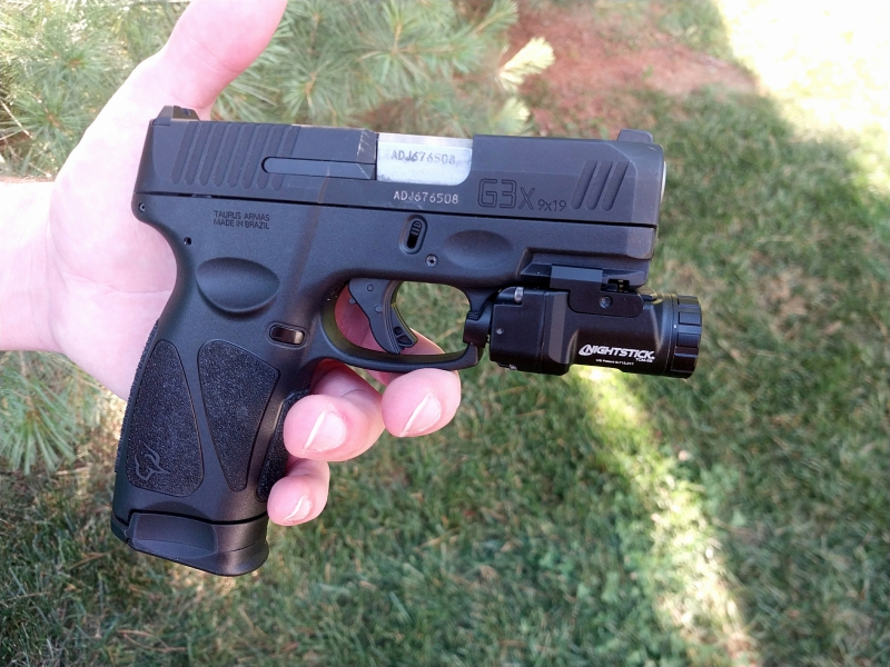 Taurus G3X pistol with 17-round magazine and weapon light