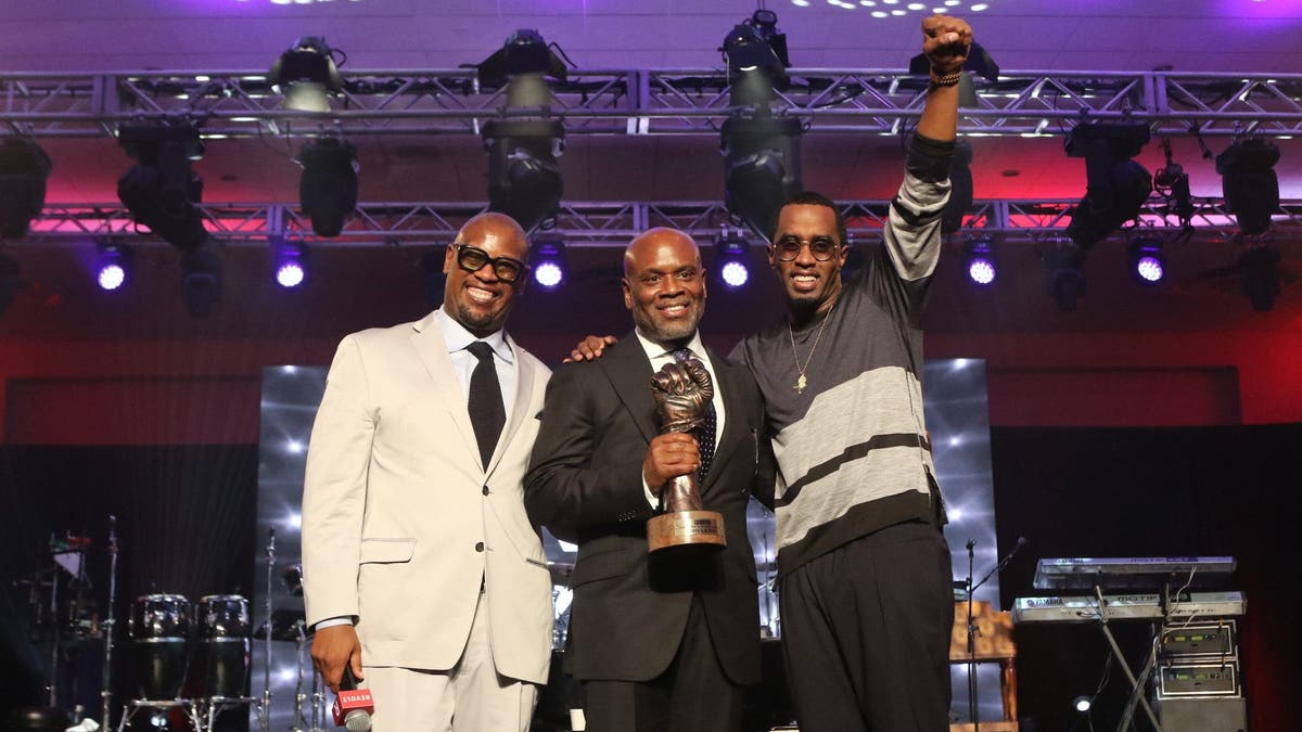 CEO of Motown Records, Andre Harrell, CEO of Epic Records L.A. Reid and Diddy and onstage