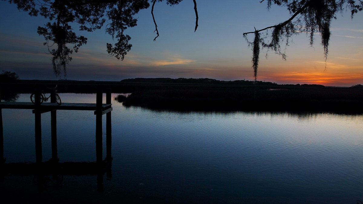 The sun sets over the marsh lands of Sapelo Island, off the coast of Georgia.