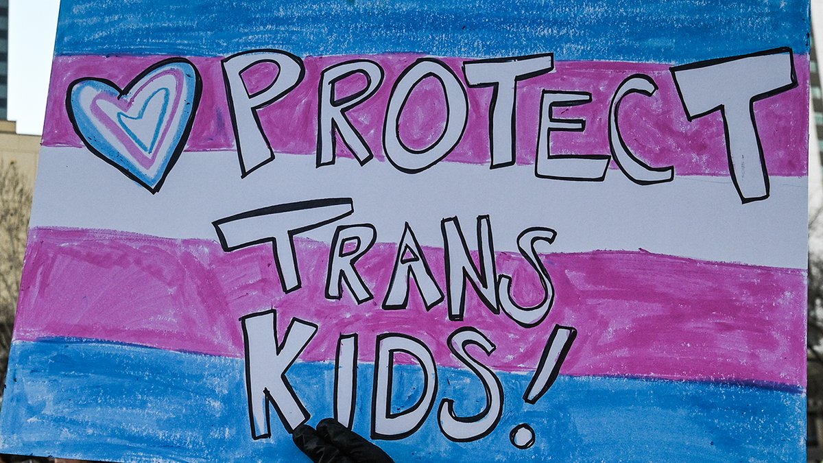 'Protect Trans Kids' sign