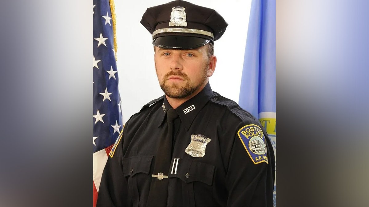 Officer John O’Keefe poses for his official headshot