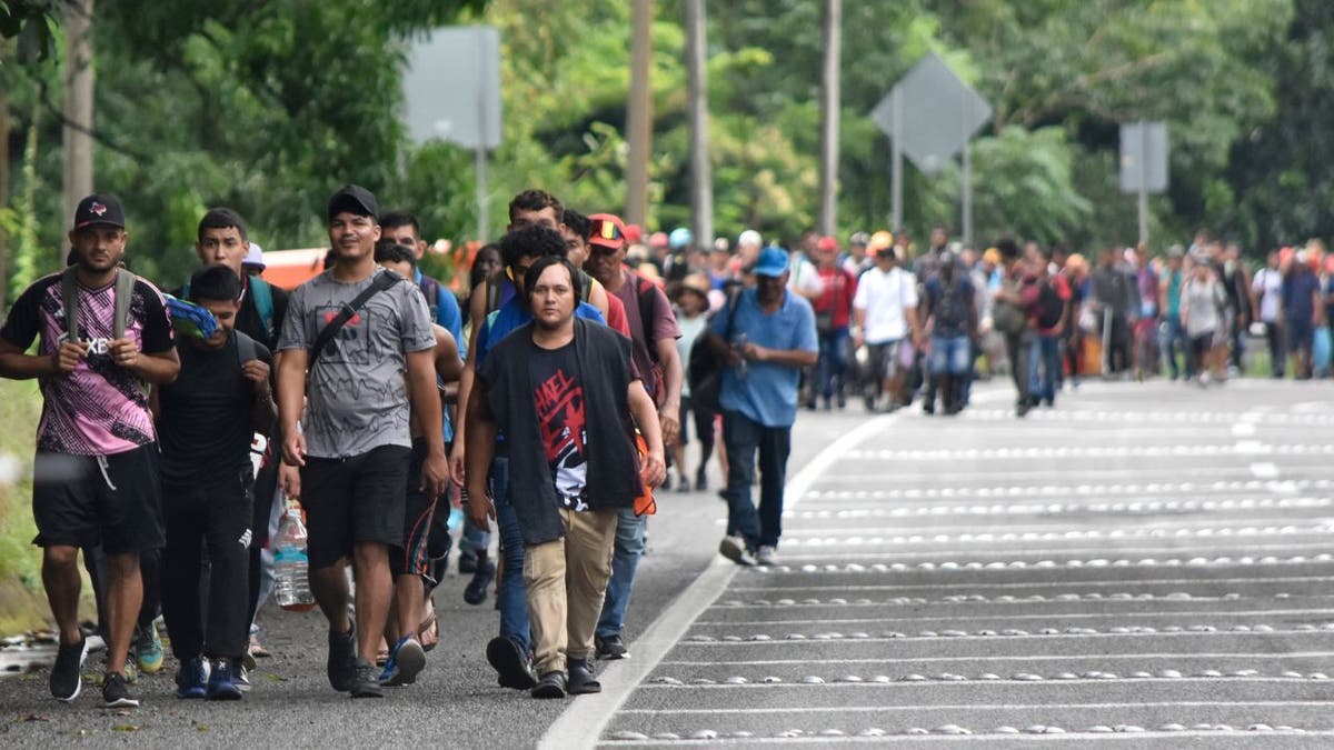 Migrants walk through Tapachula, Chiapas state, Mexico.