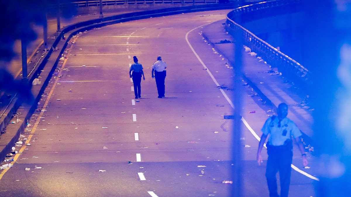 New Orleans officers walk after deadly parade