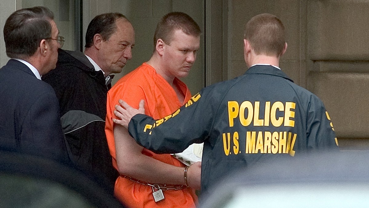 Chadrick Fulks is escorted by U.S. Marshals out of the federal courthouse