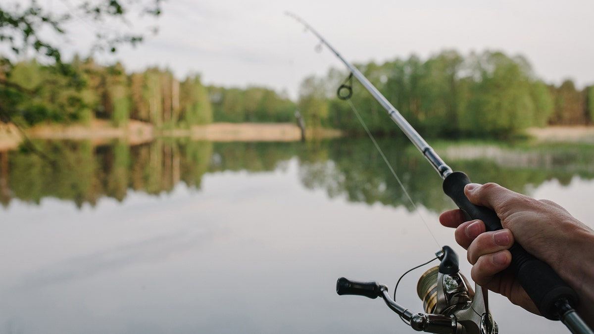 Person with fishing pole