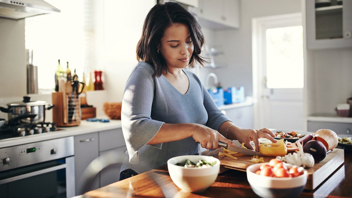 Woman cooking at home