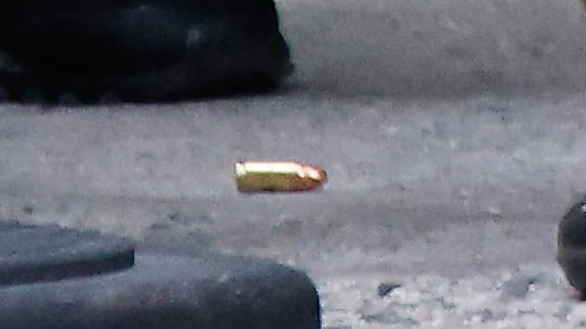 Bullets at scene outside the Hilton Hotel in midtown Manhattan where Brian Thompson, the CEO of UnitedHealthcare, was fatally shot.