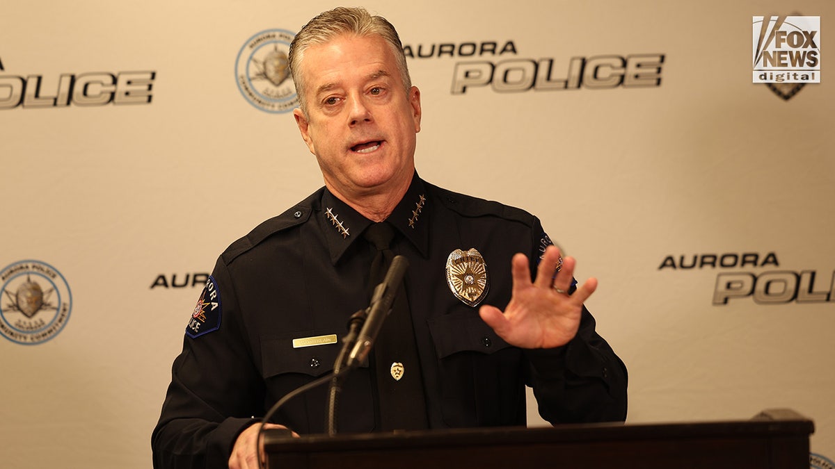 Aurora Police Department Chief Todd Chamberlain speaks to the media during a press conference