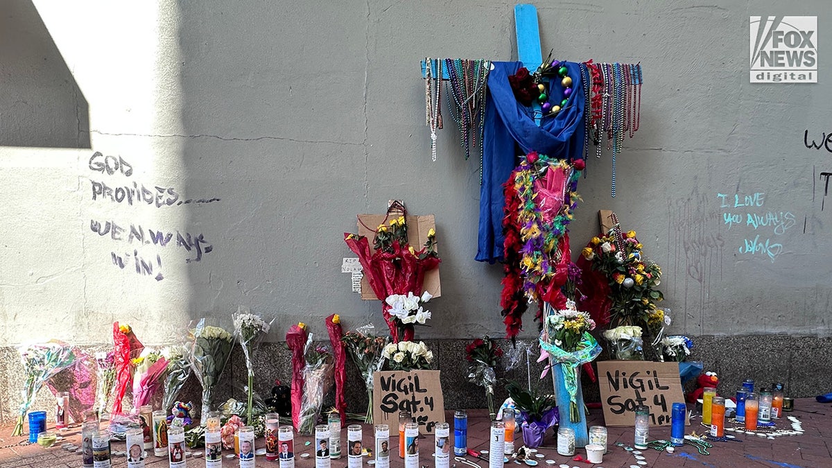 A memorial for those killed in the New Year’s Eve attack is left on Bourbon Street following the street’s reopening in New Orleans