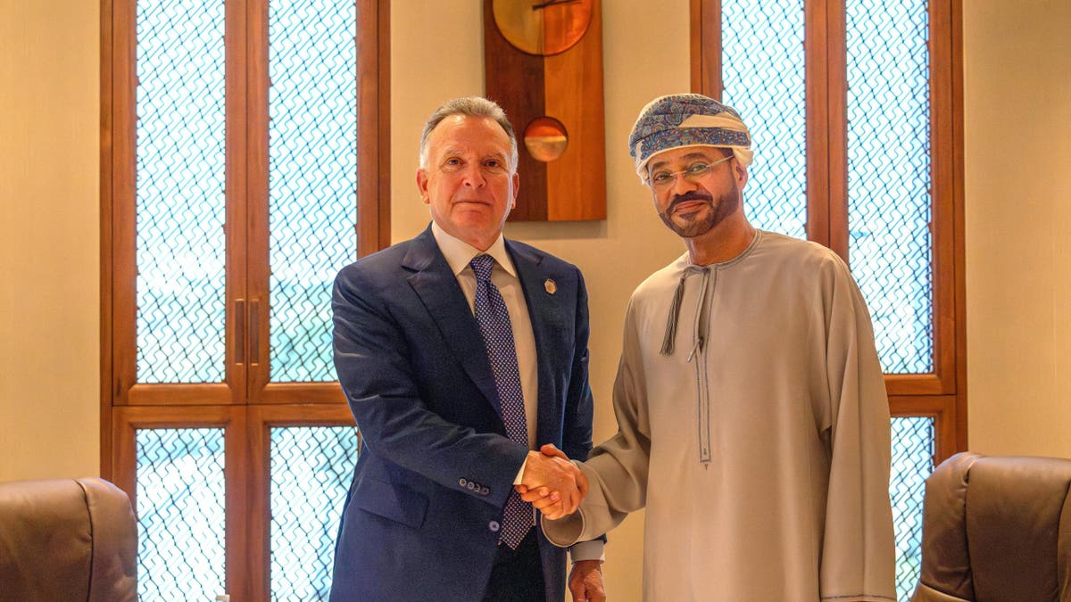U.S Special Envoy to the Middle East Steve Witkoff shakes hands with Omani Foreign Minister Sayyid Badr Albusaidi in Muscat, Oman, April 12, 2025.