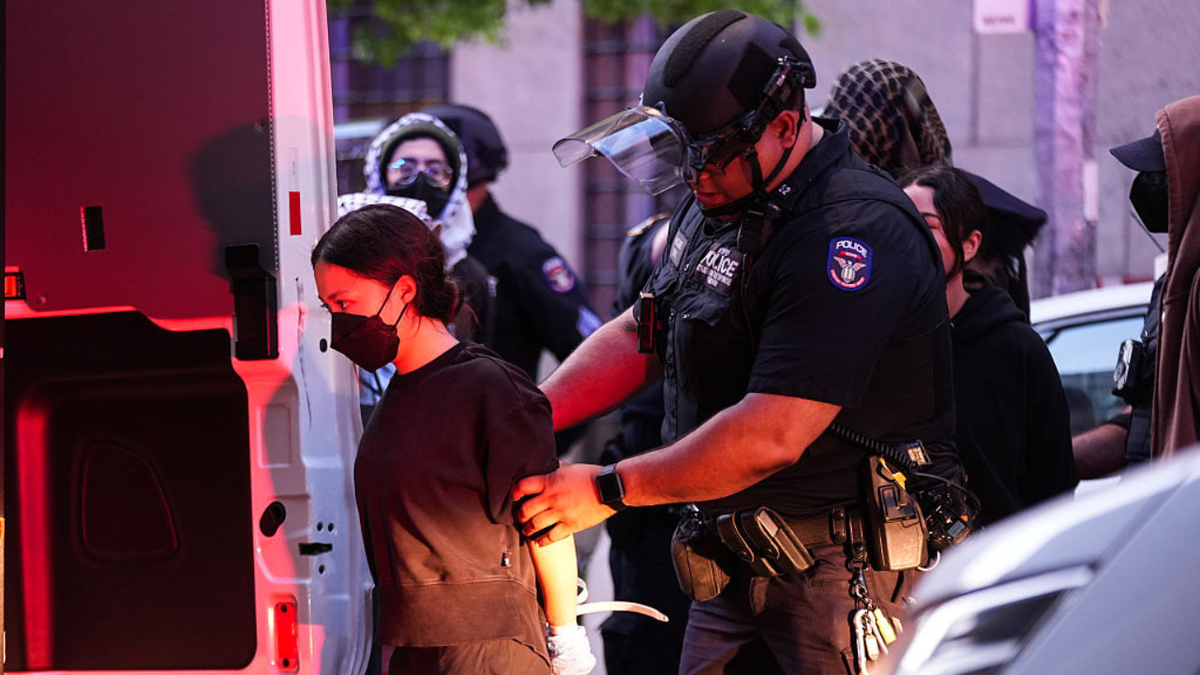Woman being arrested at Columbia University