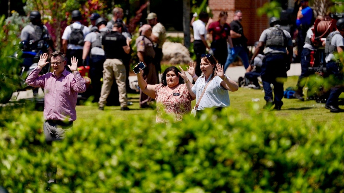 People evacuate Florida State University's campus after a mass shooting