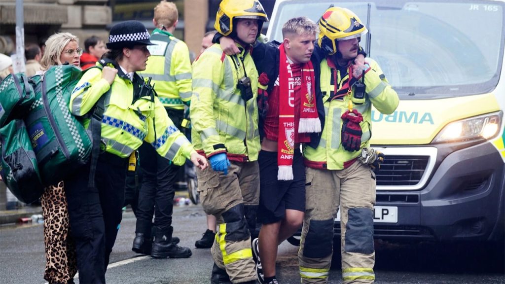 Driver arrested after vehicle plows into crowd of Liverpool soccer fans during celebration