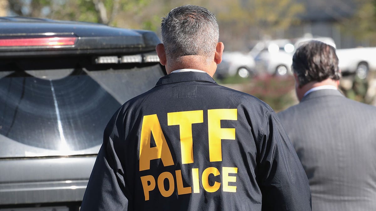 ATF Agent seen from behind
