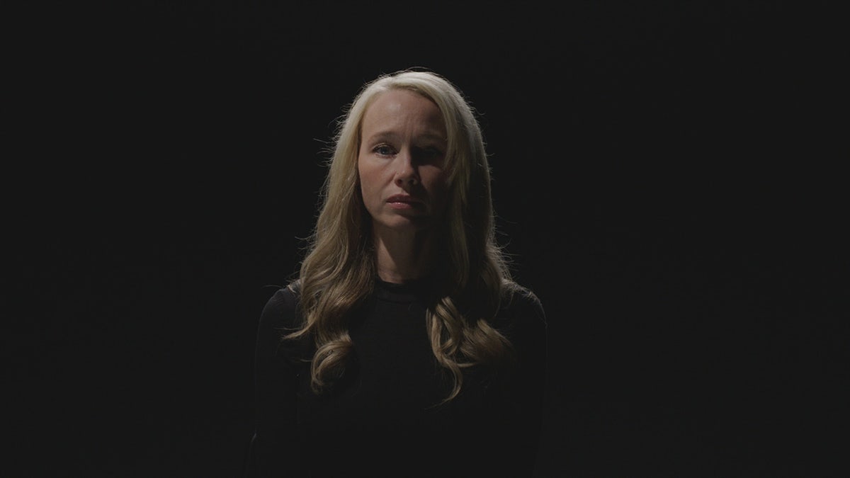 Sherri Papini wearing a black sweater in the dark.