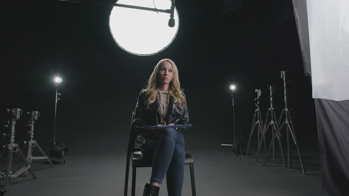 Sherri Papini speaking in front of cameras.