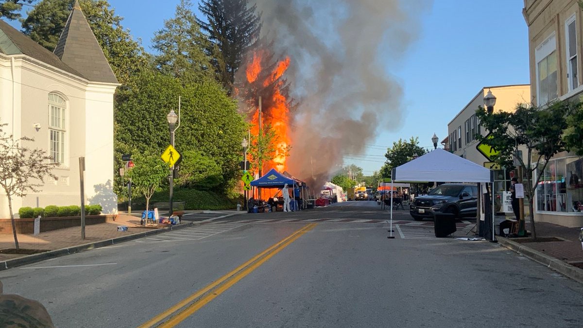 A woman was arrested after she breached barriers and drove into a crowd at a festival in Maryland. The incident occurred after a propane explosion at the event.