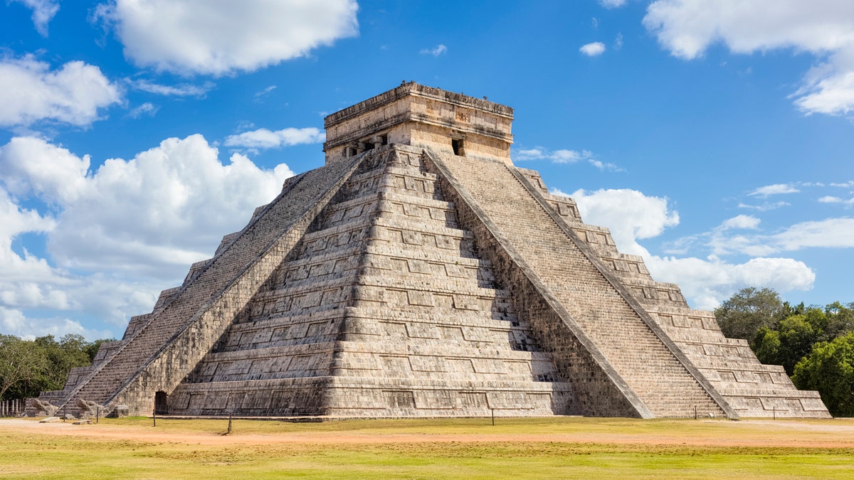 North-west view of the El Castillo (Temple of Kukulkan). El Castillo, also known as the Temple of Kukulcan, is a Mesoamerican step-pyramid that dominates the center of the Chichen Itza archaeological site in the Mexican state of YucatÃ¡n. Chichen Itza was a large pre-Columbian city built by the Maya people of the Terminal Classic period. The archaeological site is located in TinÃºm Municipality, YucatÃ¡n State, Mexico.