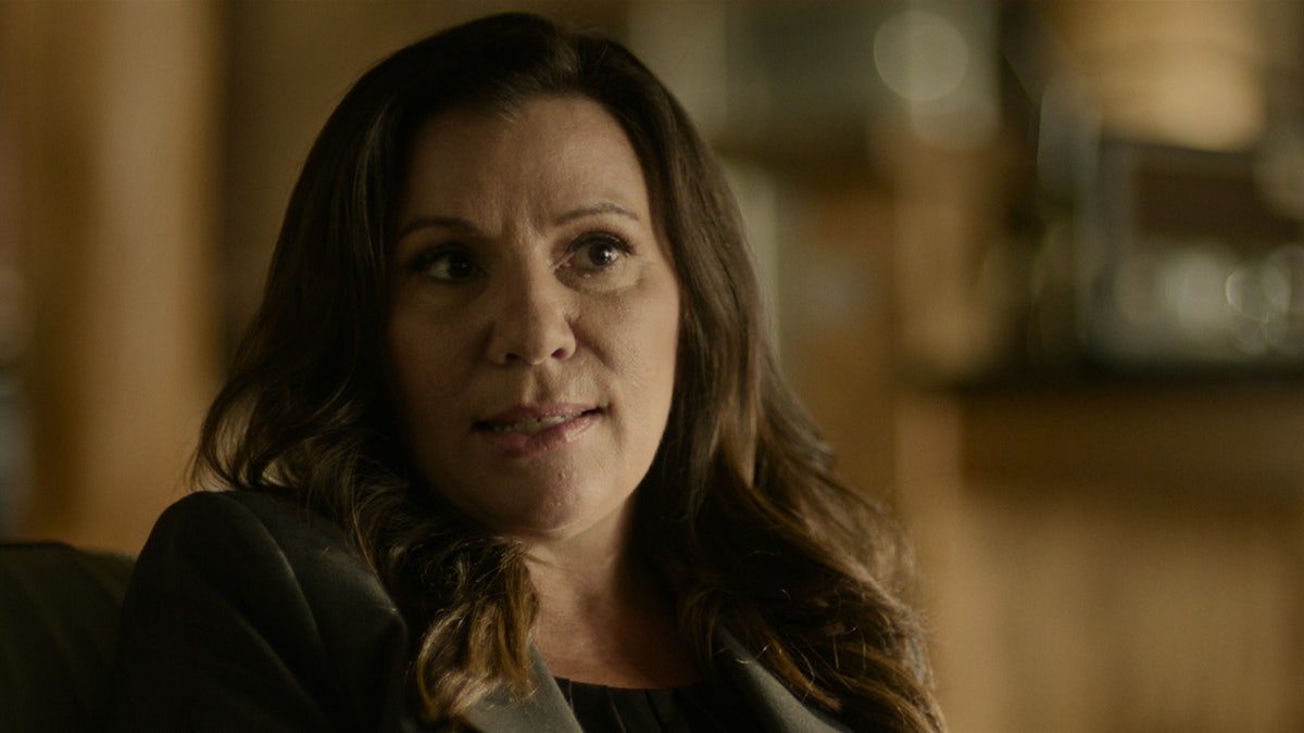 A close-up of Michelle Rosen speaking on camera.