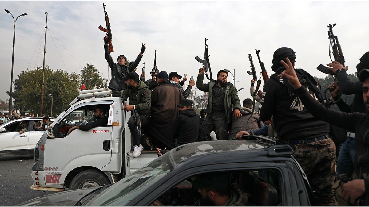 People celebrate in Damascus after fall of Assad regime
