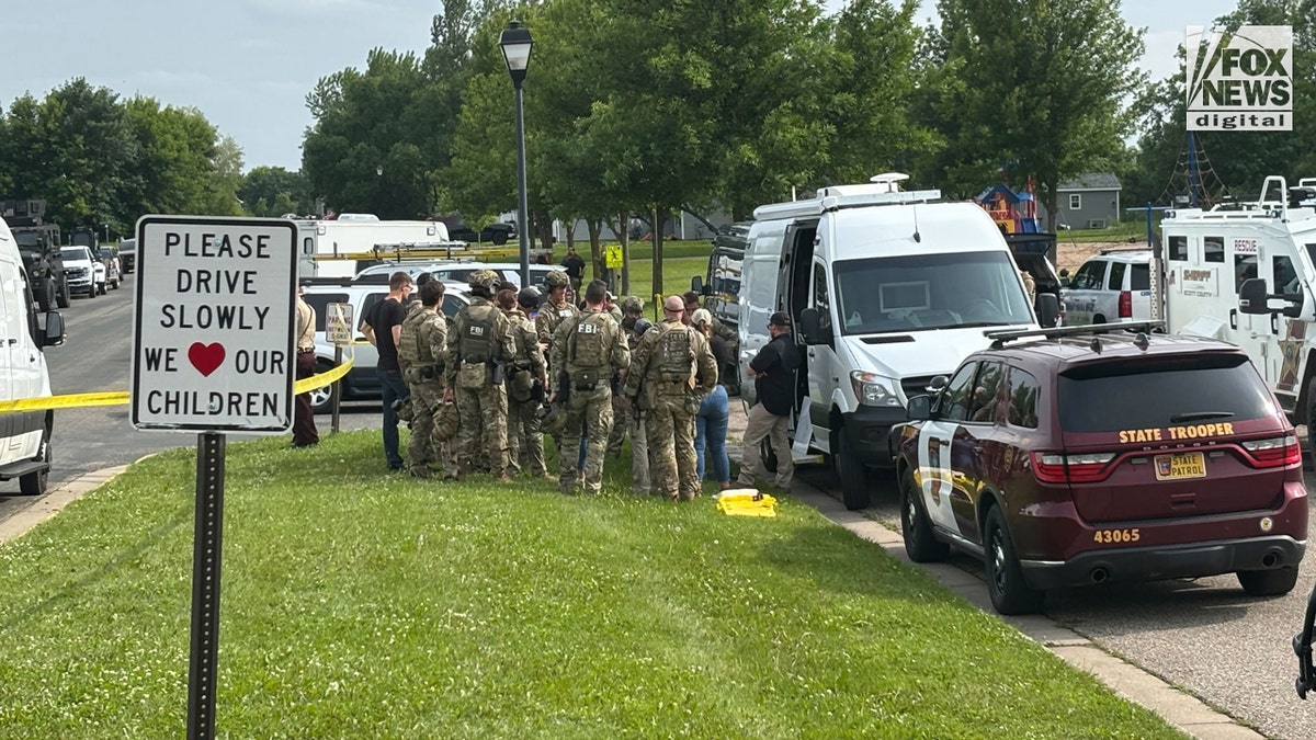 FBI agents strategizing in Green Isle, Minnesota.