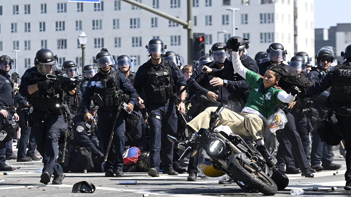 Protesters clash with police