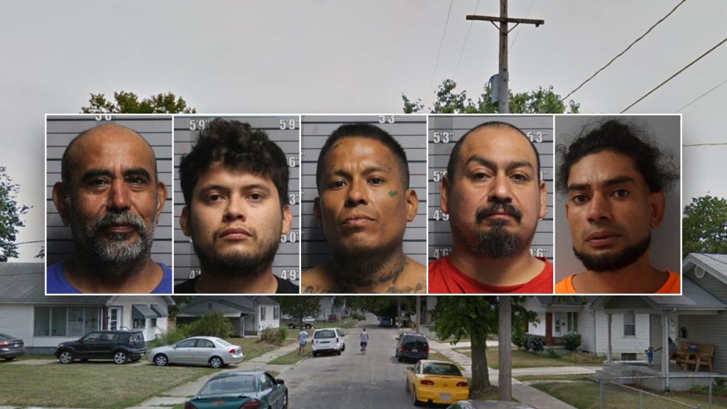 Illegal immigrant accused of peeping on girl as 4 other criminal immigrants caught living with suspect