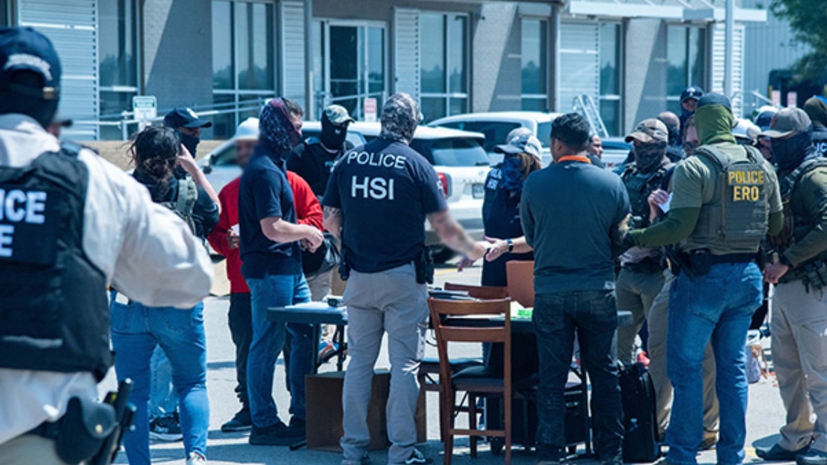 ICE agents outside Omaha plant