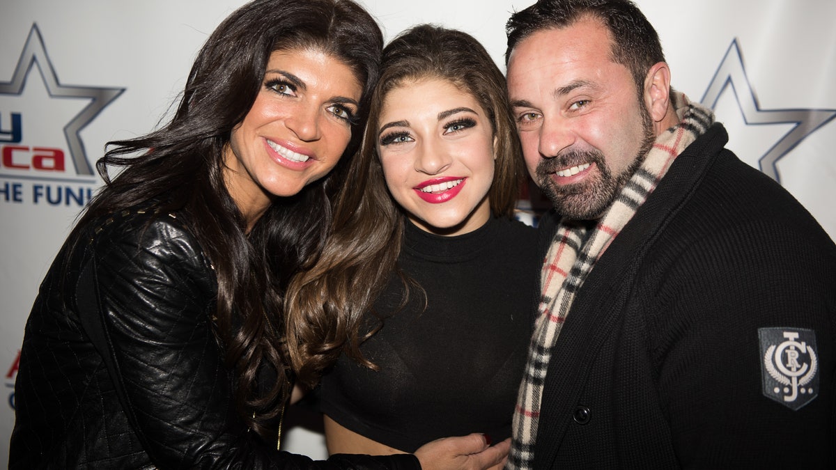 Teresa Giudice, Gia Giudice and Joe Giudice pose together