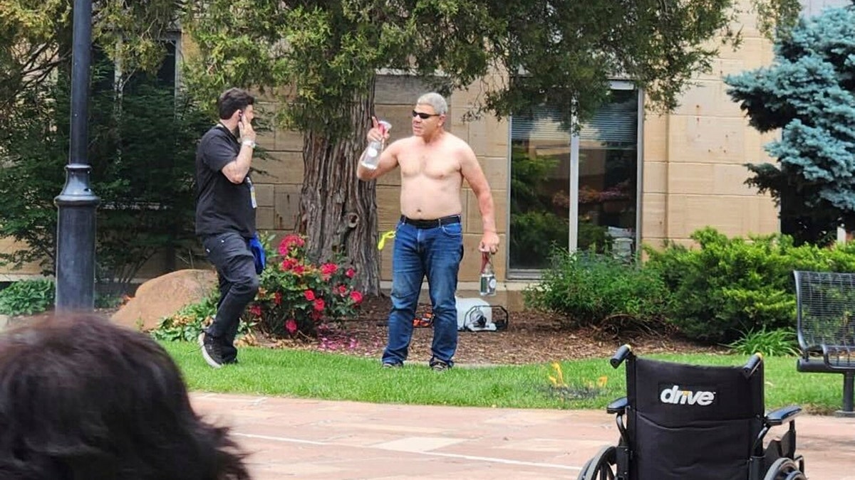 In this June 1, 2025 photo provided by Lisa Turnquist, Boulder, Colorado attack suspect Mohamed Sabry Soliman is seen as he launched a fiery attack on demonstrators at an outdoor mall, Sunday, June 1, 2025, in Boulder, Colo.