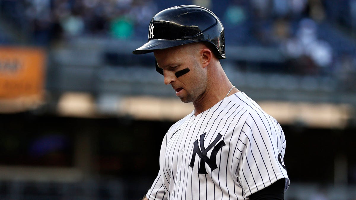 Brett Gardner walks off the field