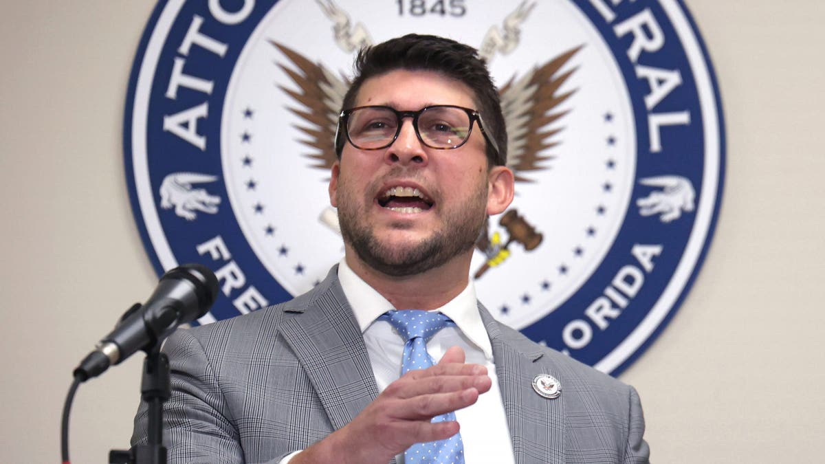 Florida AG James Uthmeier speaks at a press conference