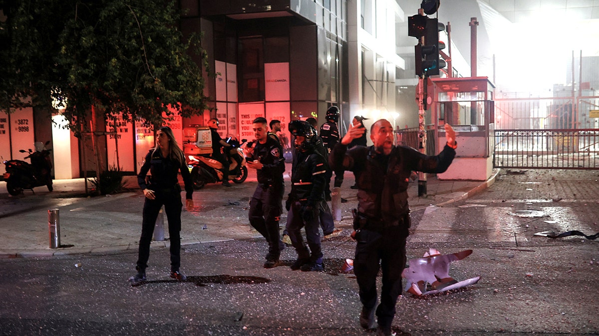 Security guards in front of a building in Tel Aviv