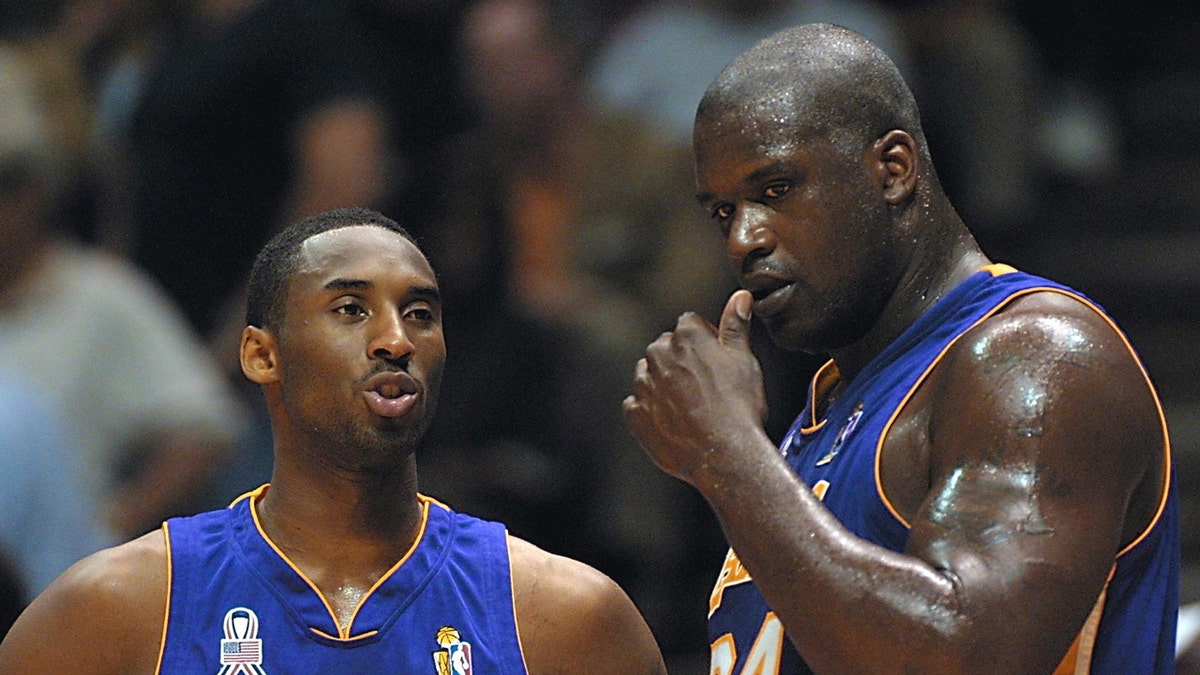 Kobe Bryant and Shaq on the basketball court.
