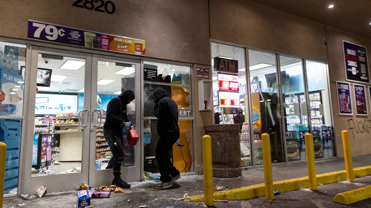 Looters break into a gas station's market place