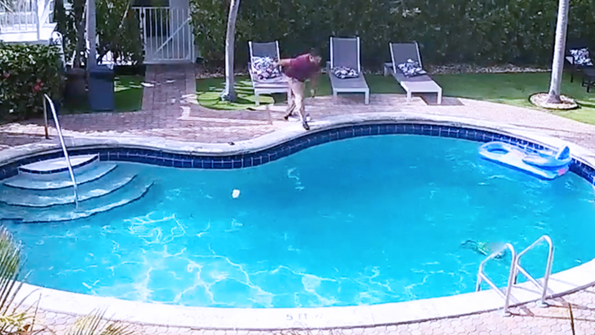 Roque Ivan Ocampo jumping into the pool