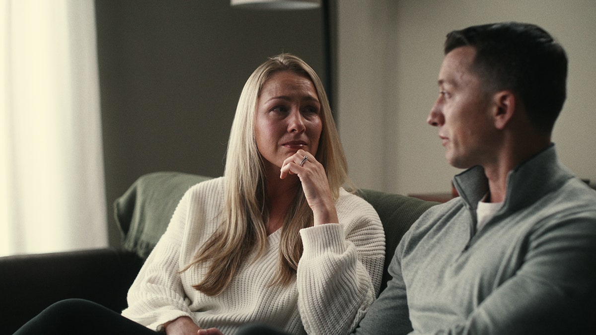 Denise Huskins listening to Aaron Quinn speak.