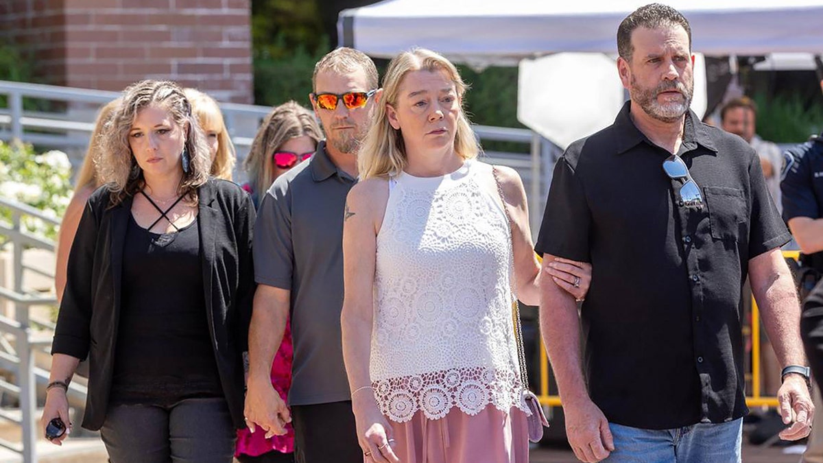 Loved ones of the victims of the Idaho murders walking together.