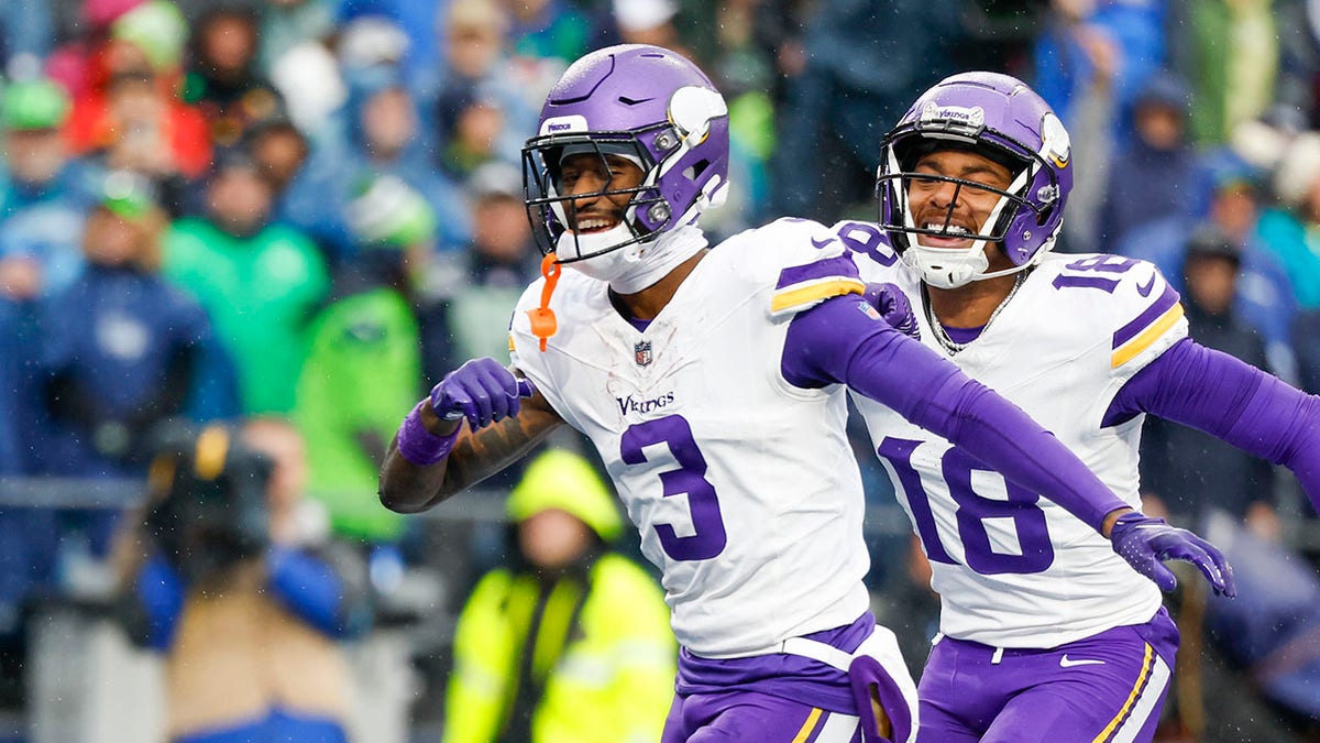 Jordan Addison celebrates