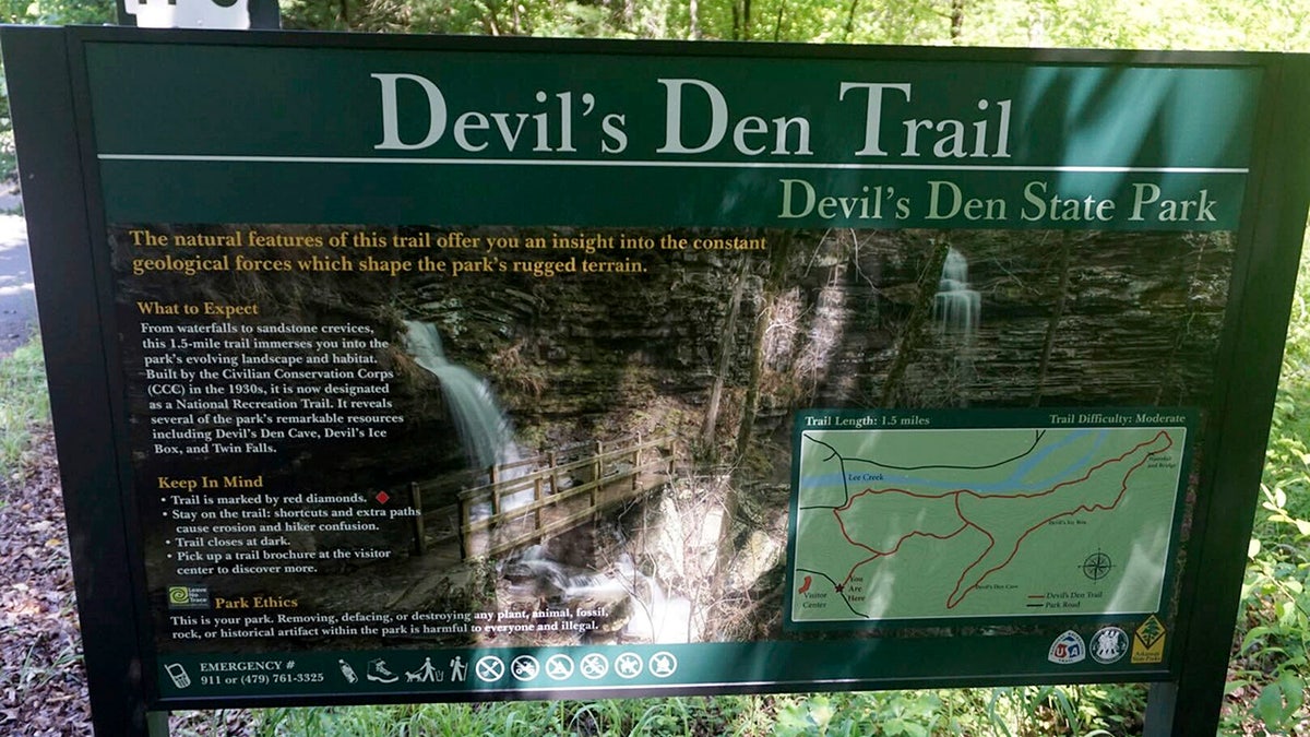 Hiking trail sign at Devil's Den State Park