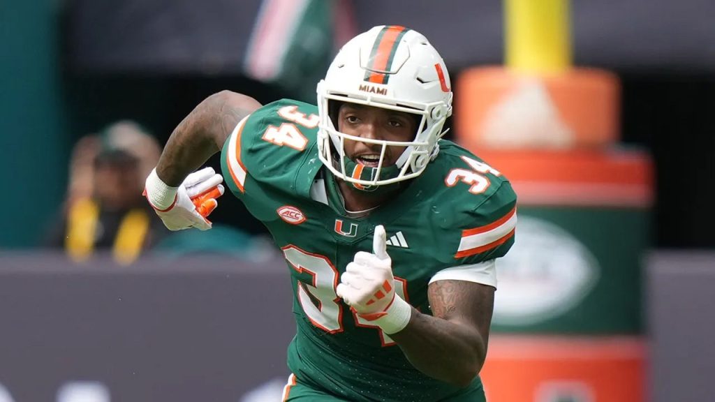Miami football player Adarius Hayes surrenders to police on charges in fatal Florida crash