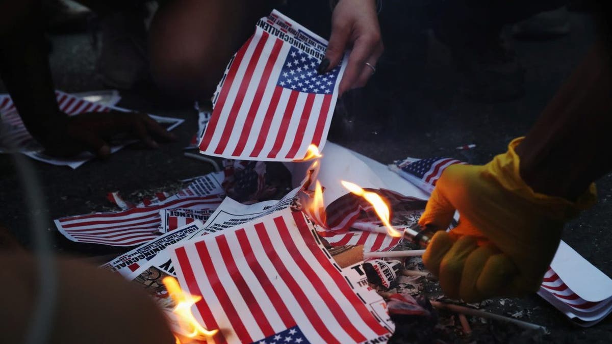 People burning American flags