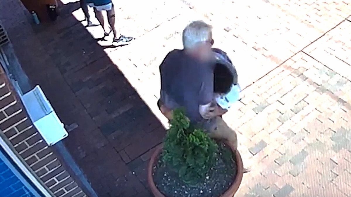 Attacker seen tackling a pro-life activist.