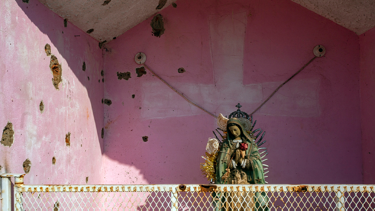 Bullet holes and Mary