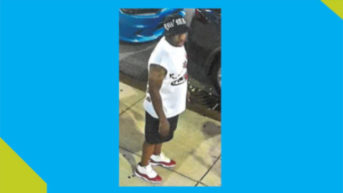 Photo of eight cincinnati beating suspect wearing black hat, white shirt black shorts