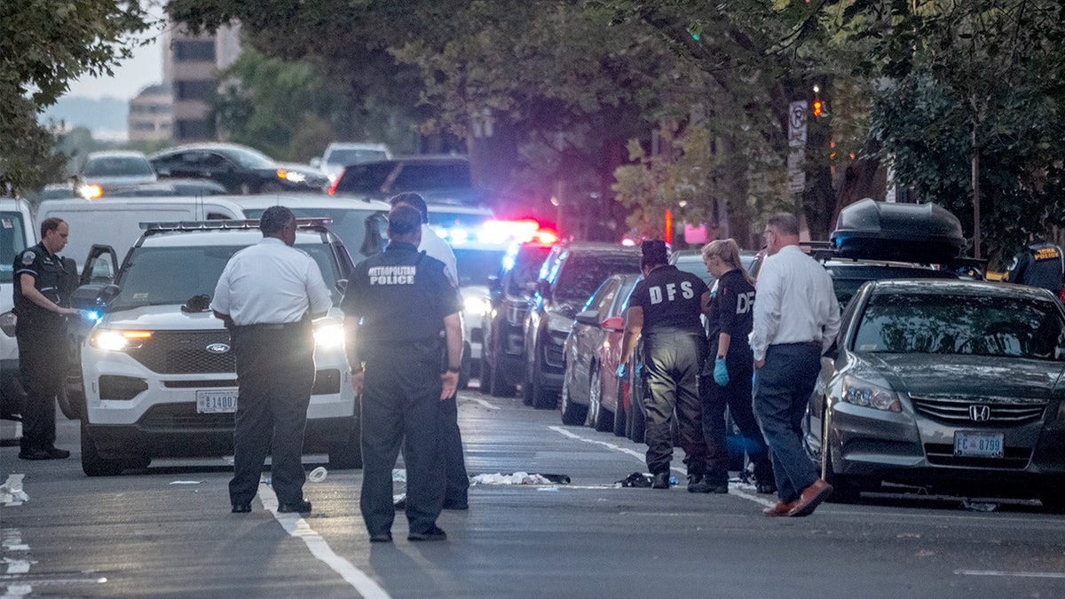 Metropolitan Police Department officers investigate a shooting