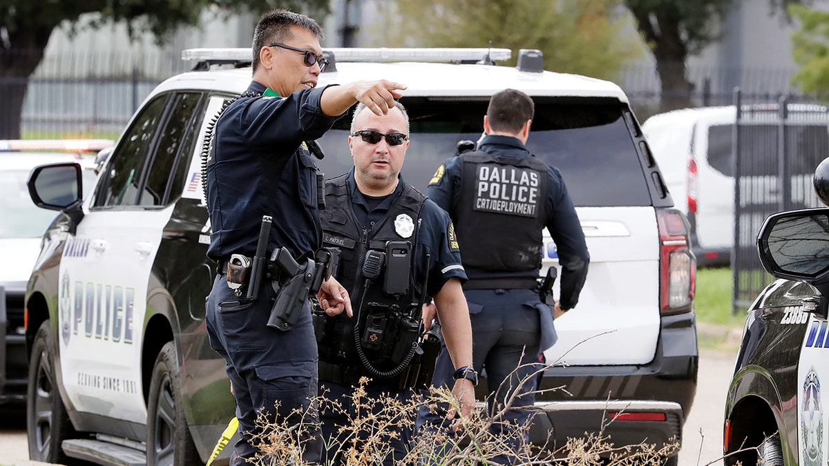 Police examine area where shooter opened fire at Dallas ICE facility