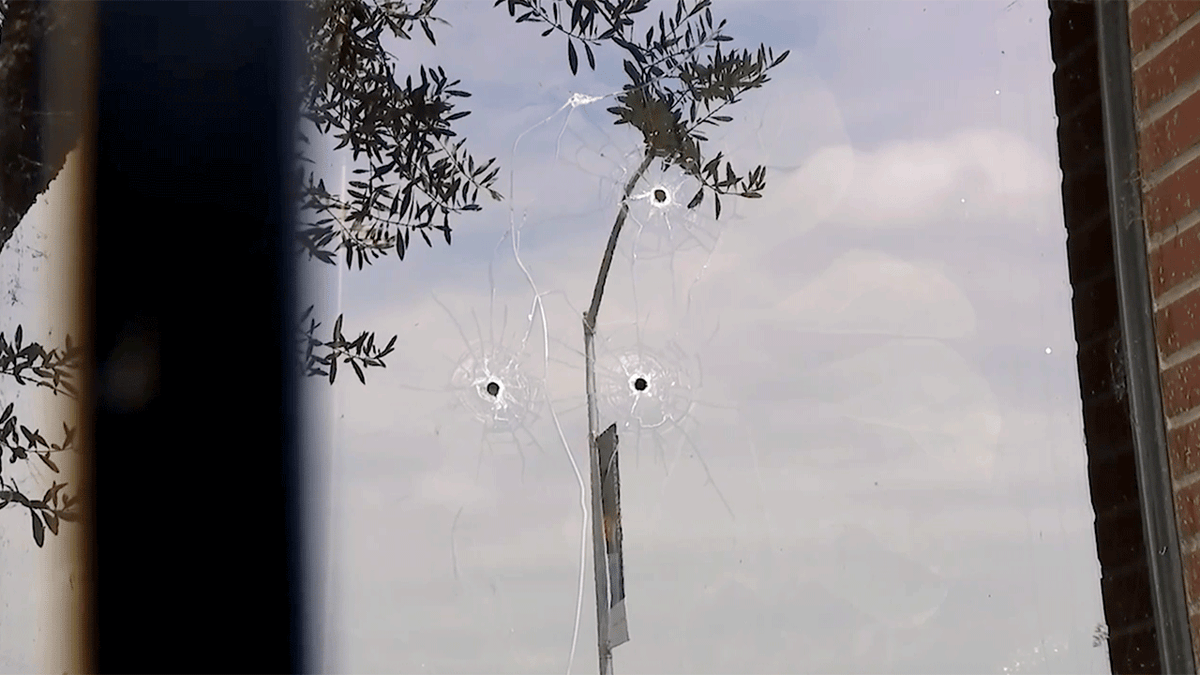 Bullet holes in ABC 10 window
